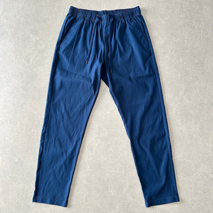 ストレッチイージーパンツ ブルー L 古着 メンズ