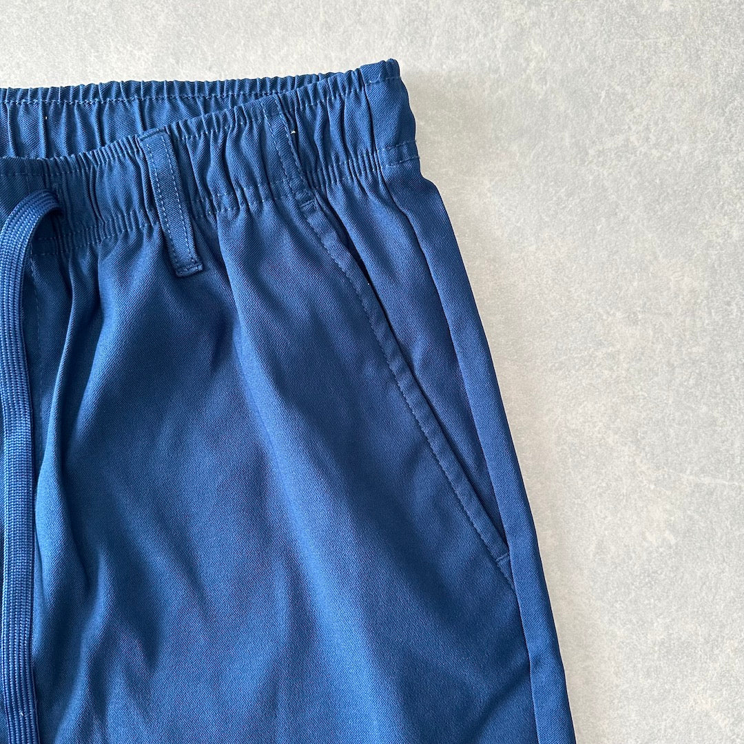 ストレッチイージーパンツ ブルー L 古着 メンズ