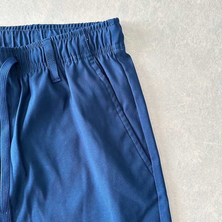 ストレッチイージーパンツ ブルー L 古着 メンズ